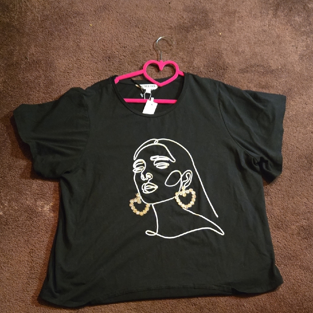 Elegant Black Graphic Tee By Love And Lace.  Woman With Rhinestone Earrings